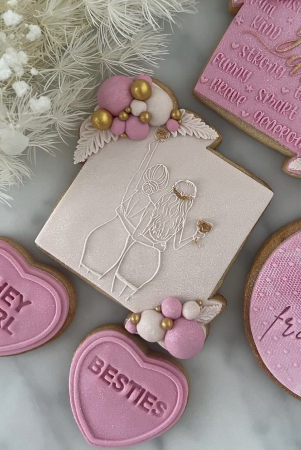 Girls Just Wanna Have Fun stamp on a square with 3D balloon garland embellishments and hand painted detailing